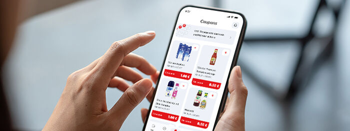Smartphone mit den aktuellen Coupons in der HIT-App Smartphone mit den aktuellen Coupons in der HIT-App